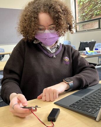 Imogen testing her project.JPG